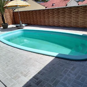  Quarto em Acomodações Particulares Casa Com Piscina